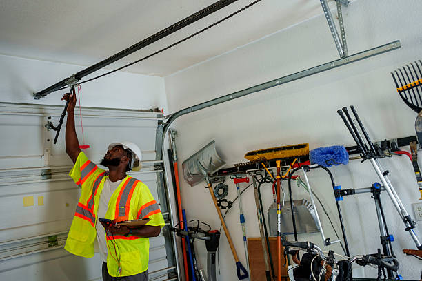 Professional Garage Door Panel Replacement technician working in Monmouth, IL